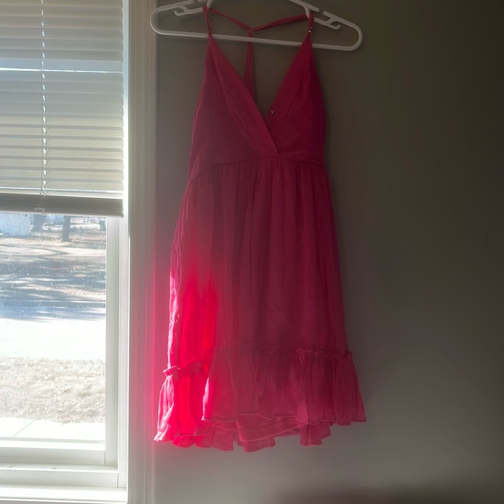 Pink dress with side zipper, front button and open back